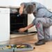 What causes an electric oven to stop working?